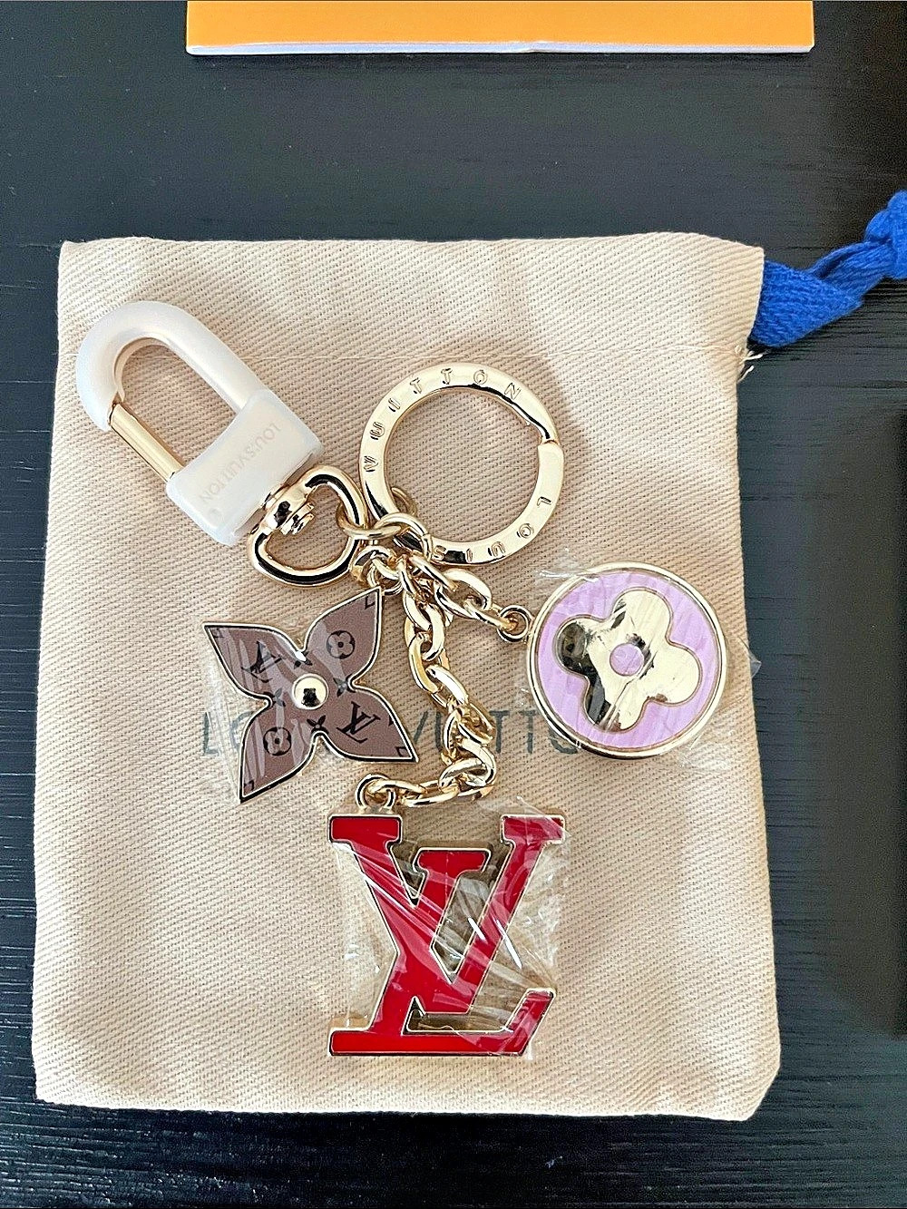 Louis Vuitton World Tour Bag Charm and Key Holder Gold & Red